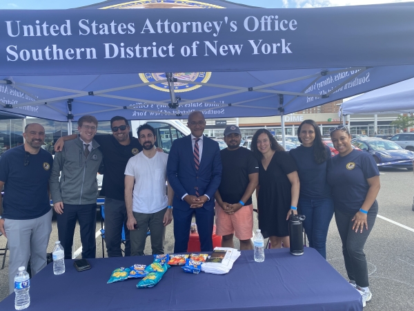 Photo of U.S. Attorney Damian Williams and SDNY employees at the National Night Out event